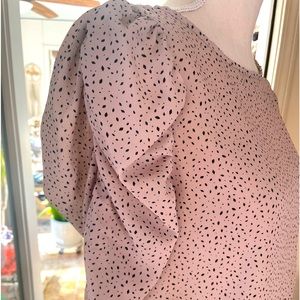 Flirty, fun pink polka dot top